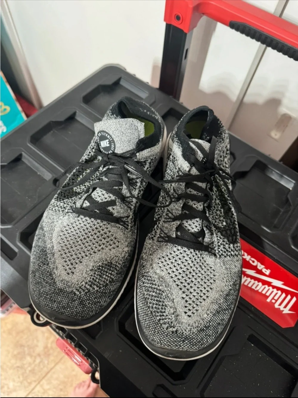 Nike Black and Lime Green Flyknit Trainer